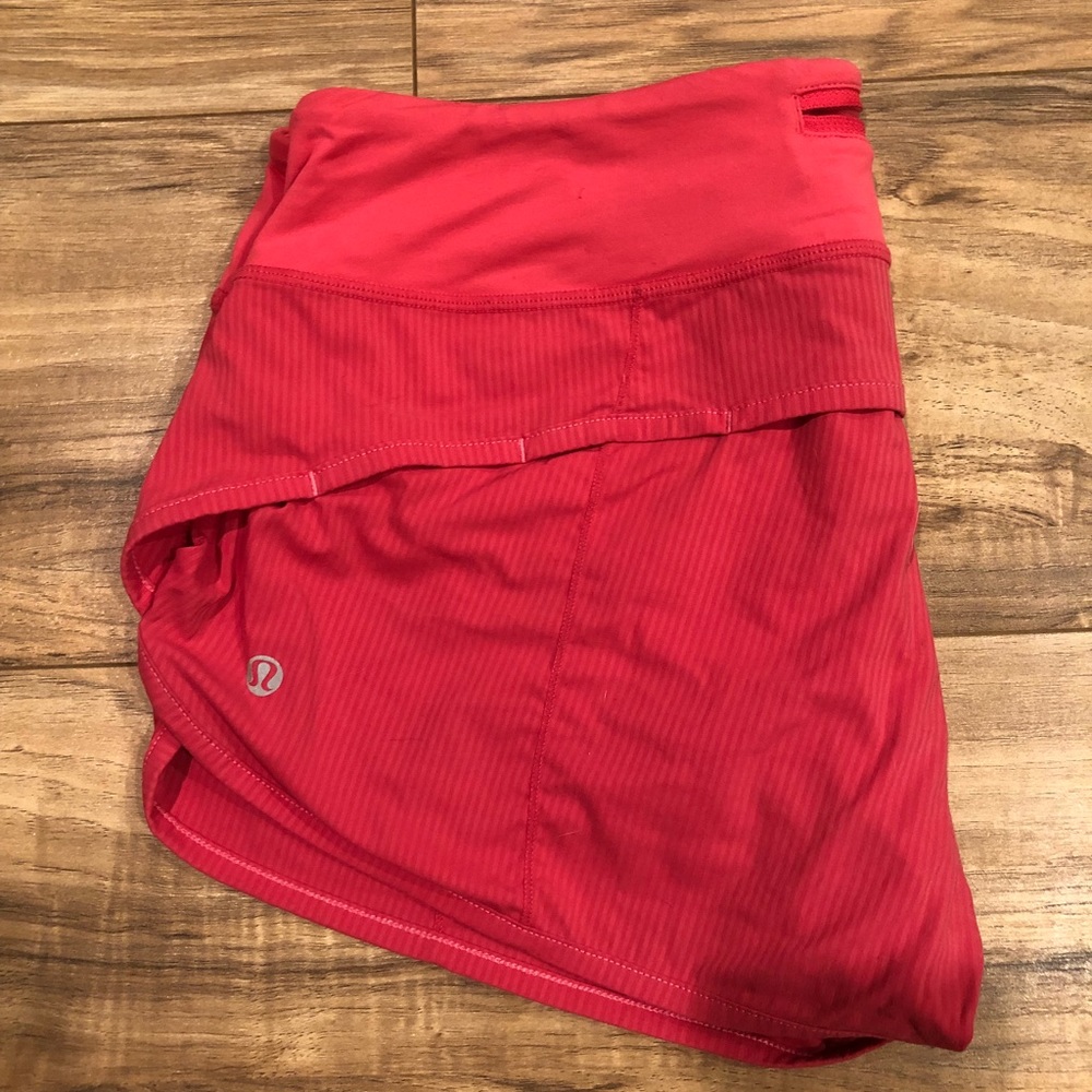 Pink Lululemon Speed Out workout shorts size 8